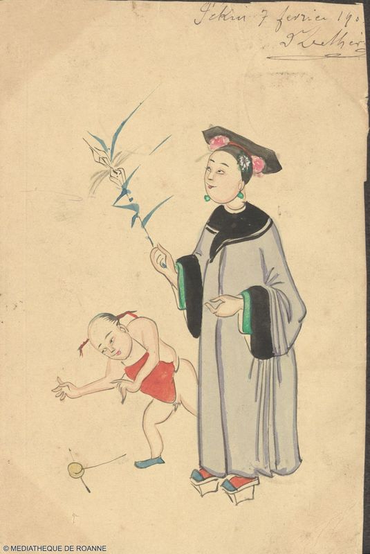 Femme chinoise tenant une fleur avec enfant